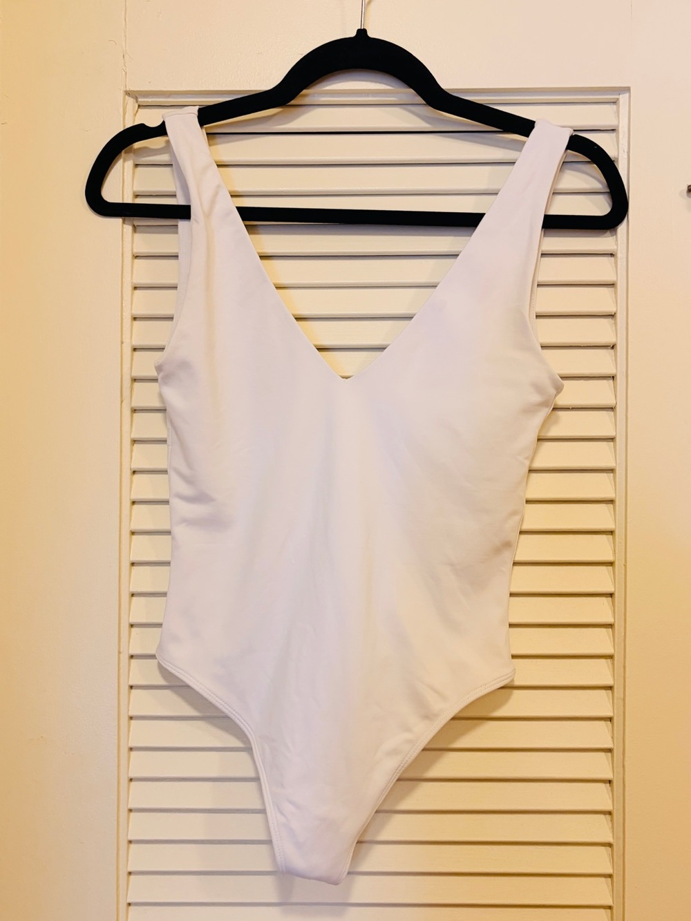 Aritzia White V-Neck Bodysuit